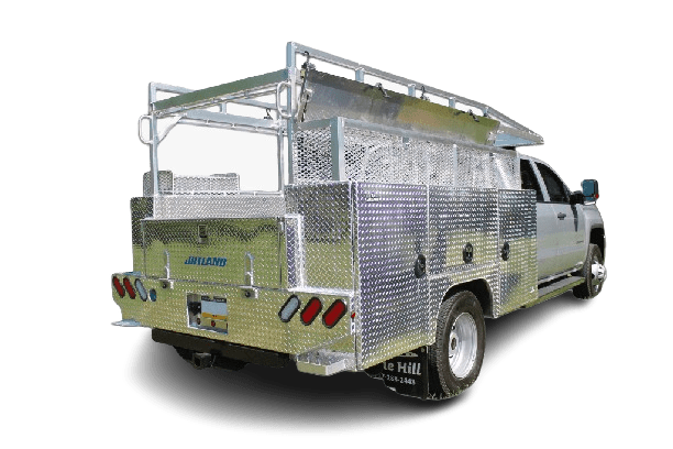 Aluminum flatbed truck body with integrated tool storage